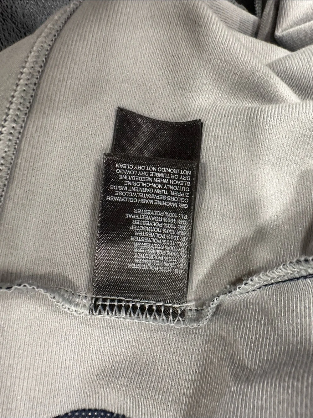 The North Face Navy with Light Gray Sleeve Softshell Jacket. Size L.